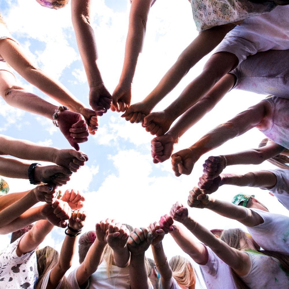 fists forming a circle